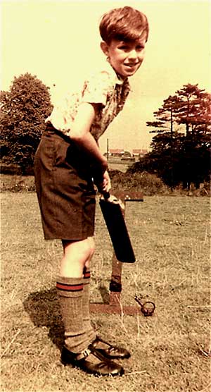 Photo of Dave Allen at 10, batting on summer holiday